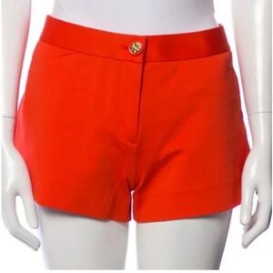 Tory Burch signature orange mini shorts. size M. NWOT